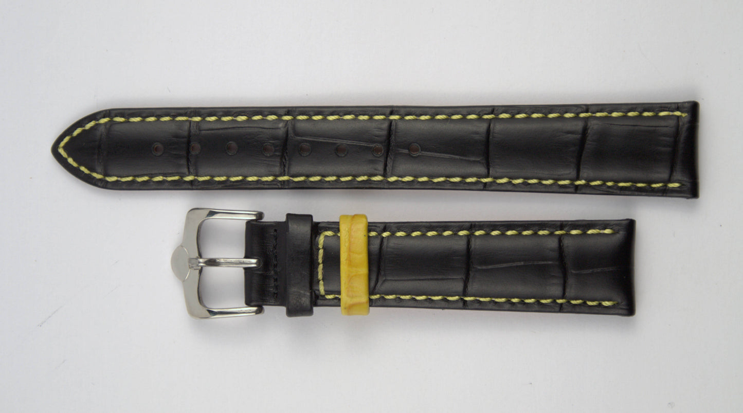 Lederuhrenarmband (Schwarz mit gelber Naht) flach aufgelegt mit weißem Hintergrund. Detaillierte Nahaufnahme.
