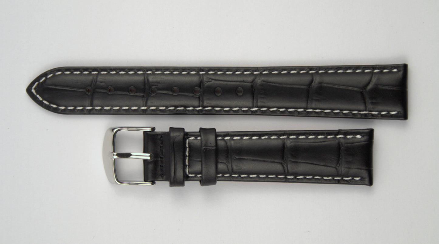 Lederuhrenarmband (Schwarz mit weißer Naht) flach aufgelegt mit weißem Hintergrund. Detaillierte Nahaufnahme.