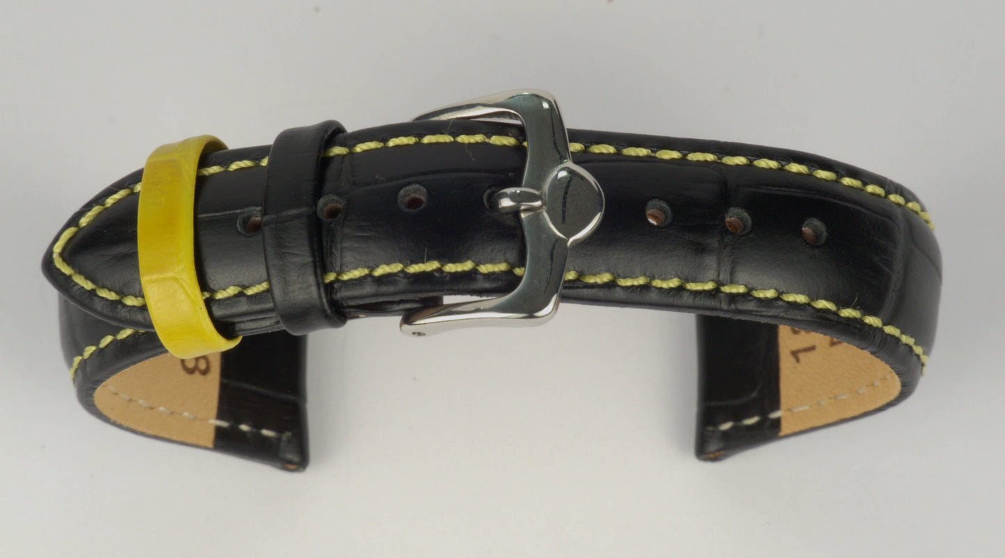 Lederuhrenarmband (Schwarz mit gelber Naht) zu einem Bogen geformt mit weißem Hintergrund. Detaillierte Nahaufnahme.