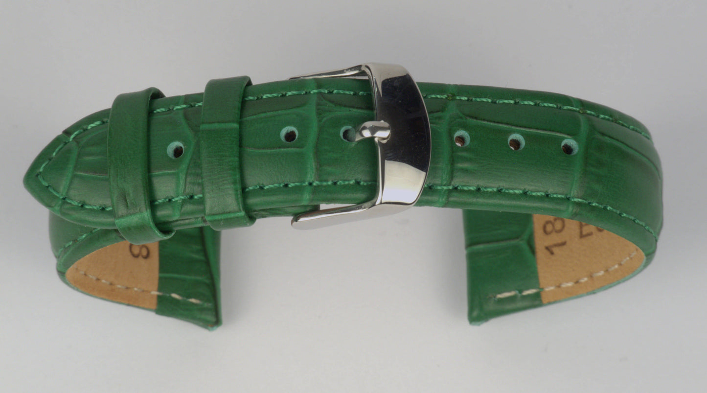 Lederuhrenarmband (Grün) zu einem Bogen geformt mit weißem Hintergrund. Detaillierte Nahaufnahme.