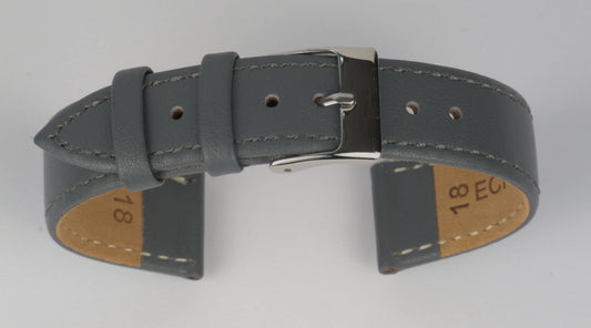 Lederuhrenarmband (Dunkelgrau) zu einem Bogen geformt mit weißem Hintergrund. Detaillierte Nahaufnahme.