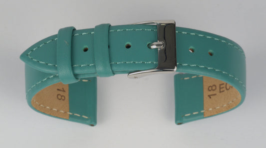 Lederuhrenarmband (Türkis) zu einem Bogen geformt mit weißem Hintergrund. Detaillierte Nahaufnahme.