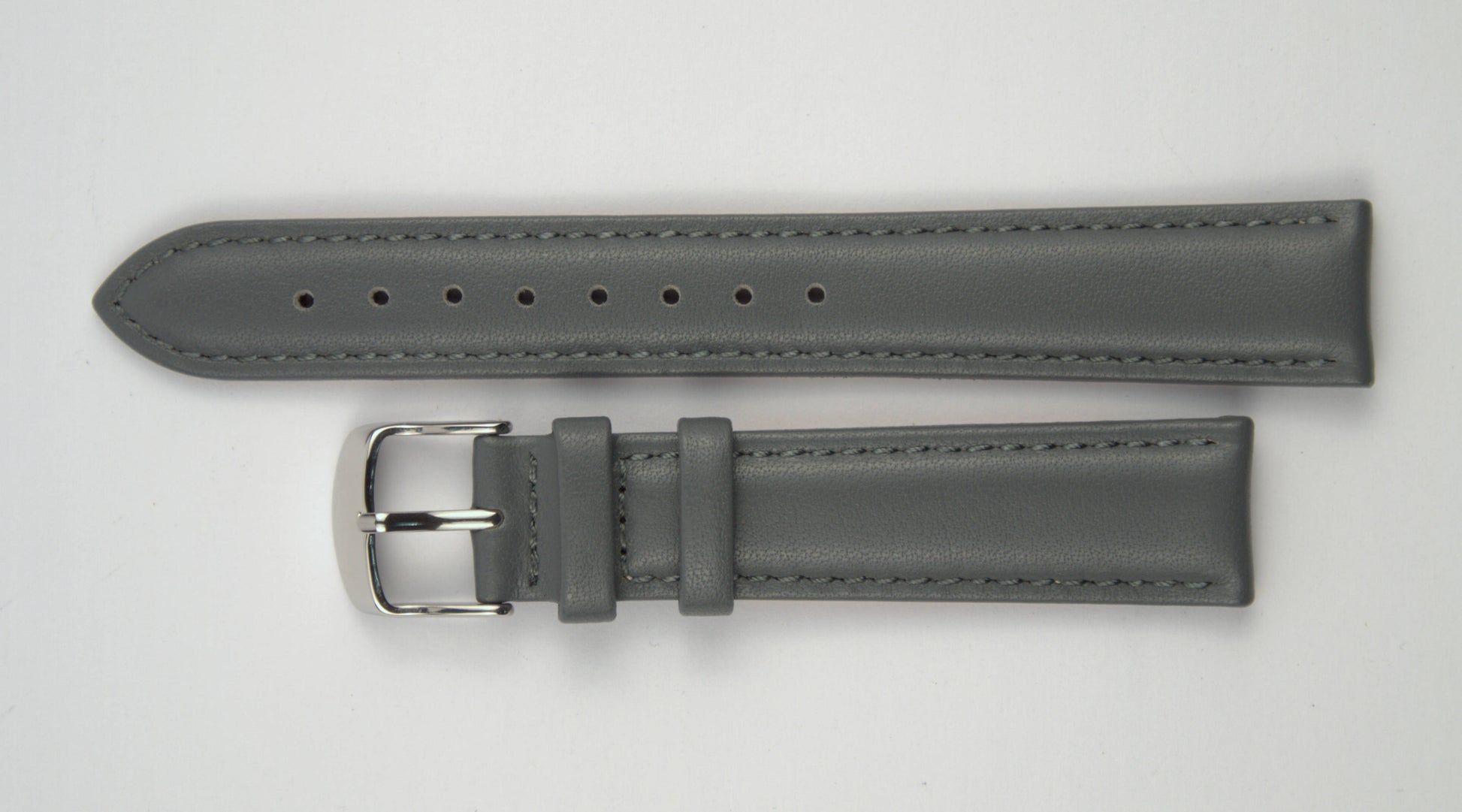 Lederuhrenarmband (Dunkelgrau) flach aufgelegt mit weißem Hintergrund. Detaillierte Nahaufnahme.