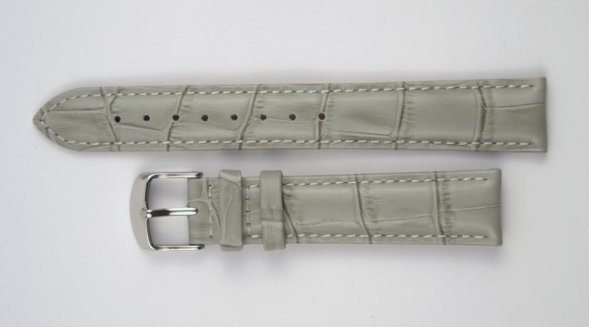 Lederuhrenarmband (Hellgrau) flach aufgelegt mit weißem Hintergrund. Detaillierte Nahaufnahme.