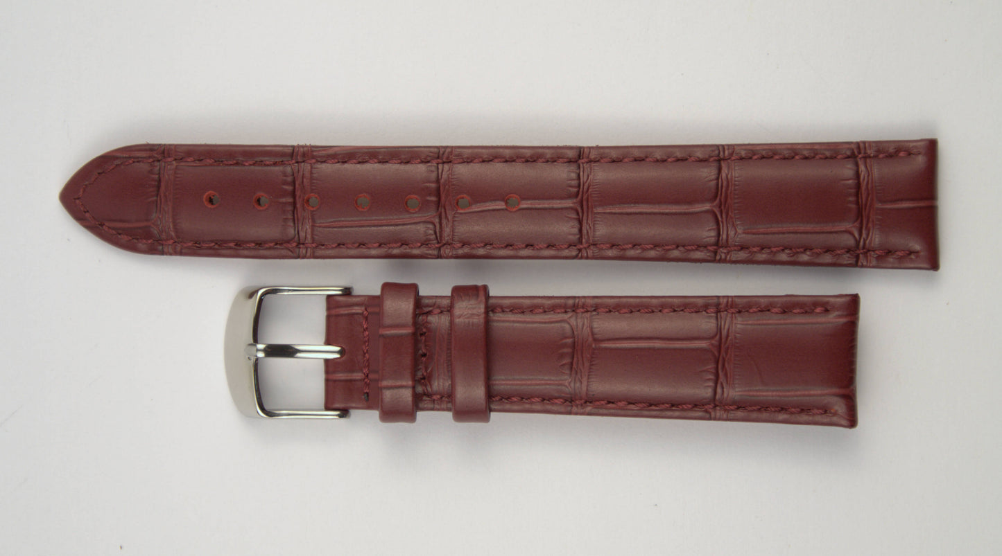 Lederuhrenarmband (Weinrot) flach aufgelegt mit weißem Hintergrund. Detaillierte Nahaufnahme.