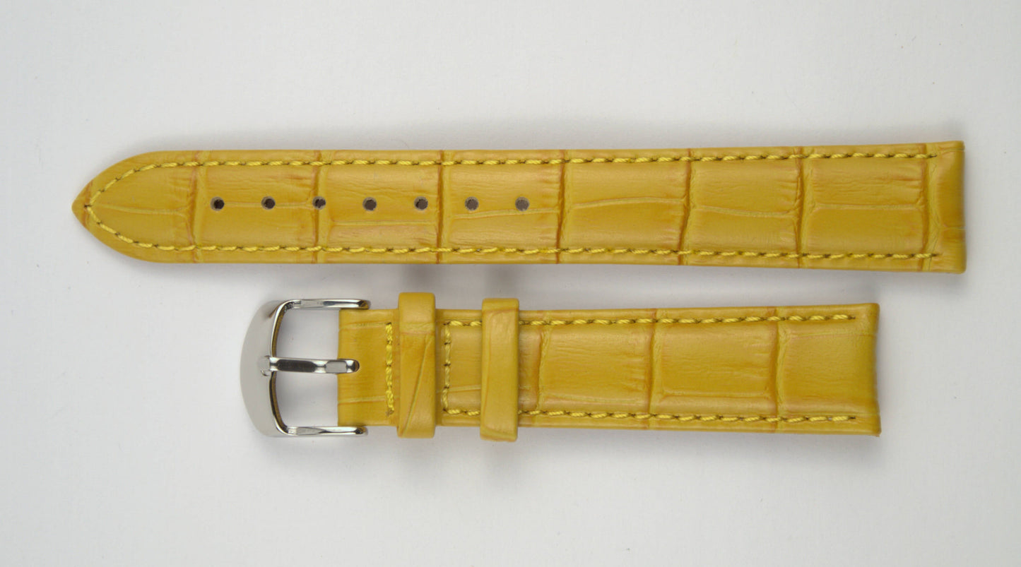 Lederuhrenarmband (Gelb) flach aufgelegt mit weißem Hintergrund. Detaillierte Nahaufnahme.