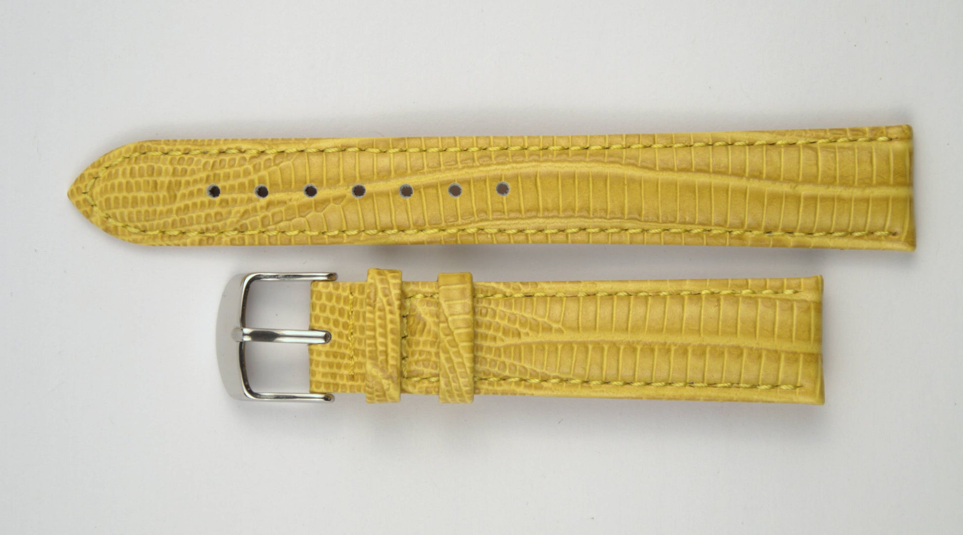 Lederuhrenarmband (Gelb) flach aufgelegt mit weißem Hintergrund. Detaillierte Nahaufnahme.
